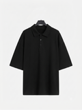 Polo oversize con bottoni